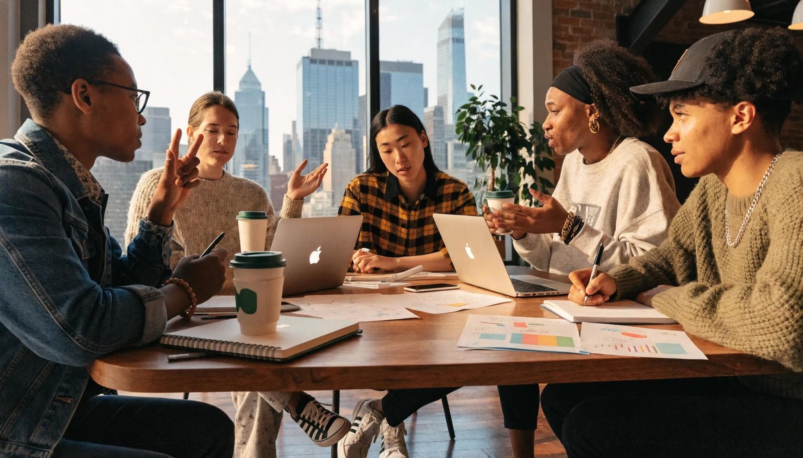 Diverse team collaborating on SEO strategies in a modern office environment